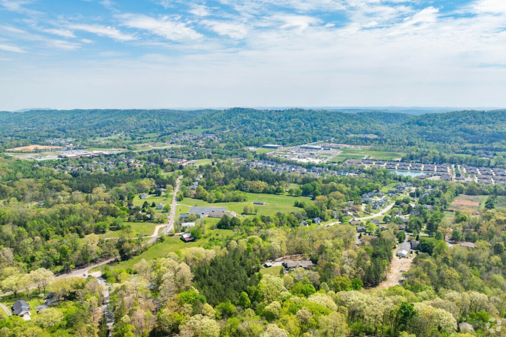 Aerial view of residential neighborhoods and green spaces in East Brainerd TN