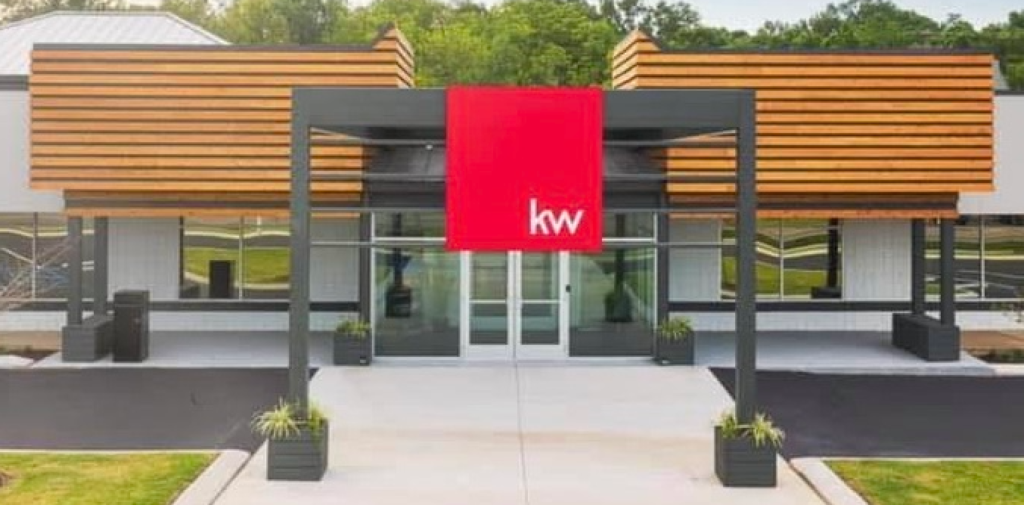 Keller Williams Greater Chattanooga office building exterior with glass entrance and red KW logo.